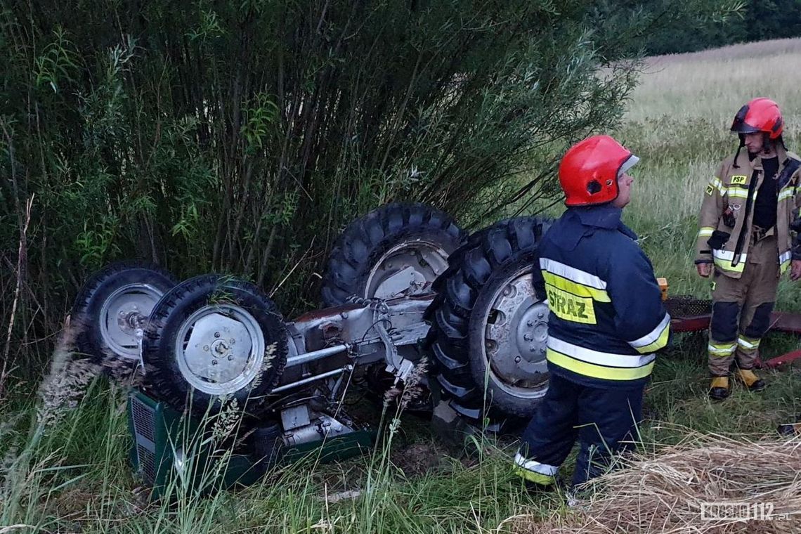 ? Kobylany. Ciągnik rolniczy do góry kołami. Traktorzysta ranny